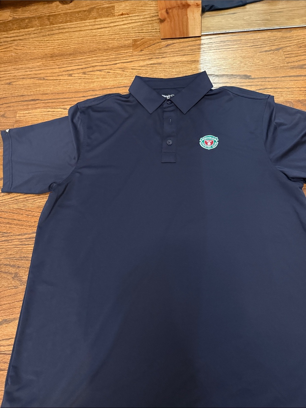 Men's Navy Polo with Embroidered Shield Crest